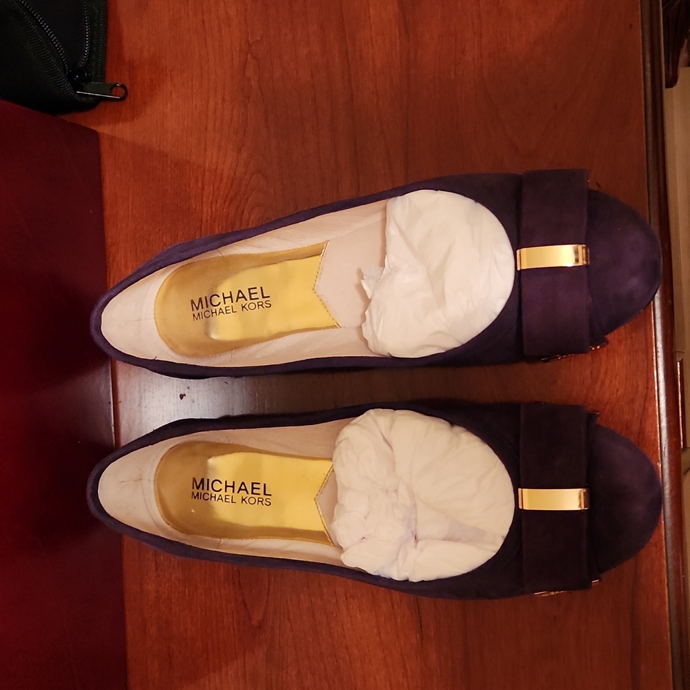 Michael Kors flats.